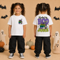 A young girl with curly brown hair in pigtails is shown from the front and back wearing a white graphic t-shirt and black cargo pants. The background is a warm beige color decorated with Halloween elements including pumpkins, ghost decorations, and bat silhouettes.